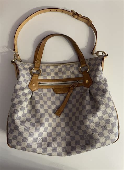 geanta originala louis vuitton pret|geanta Louis Vuitton originala.